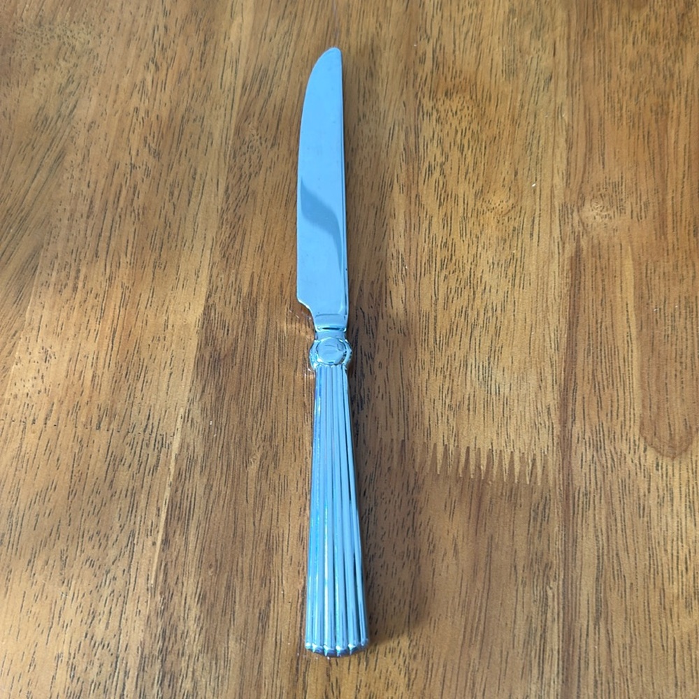 Waterford stainless butter knife. 18/10 handle. Carleton pattern. 9 3/4”.